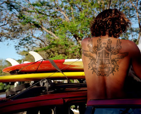 polynesian half sleeve tattoo skull and cross bones tattoos